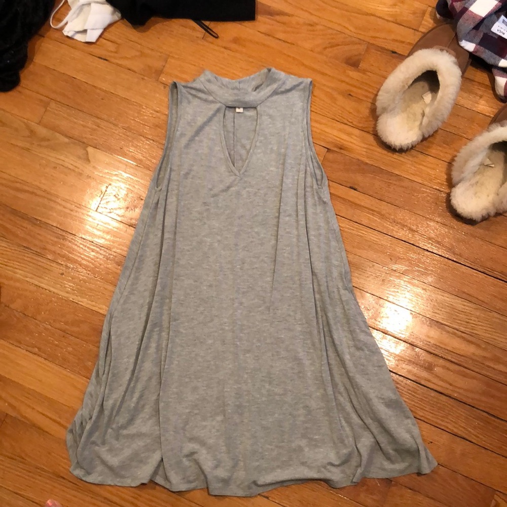 Grey, flowy dress with triangle cutout